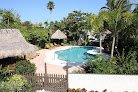 Negocio Sunrise Garden Resort On Anna Maria Island By Vacasa